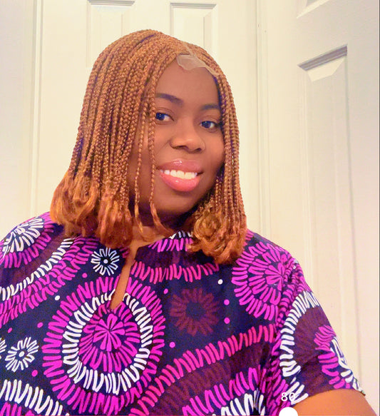 Briaded side parting corn roll